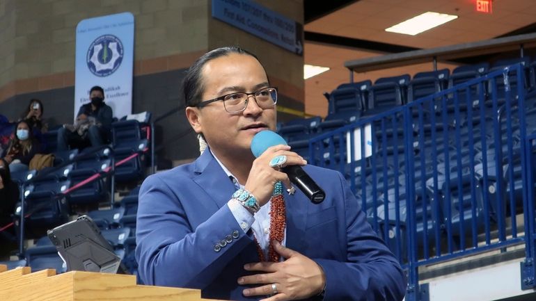 Navajo Nation President Buu Nygren addresses a crowd at an...