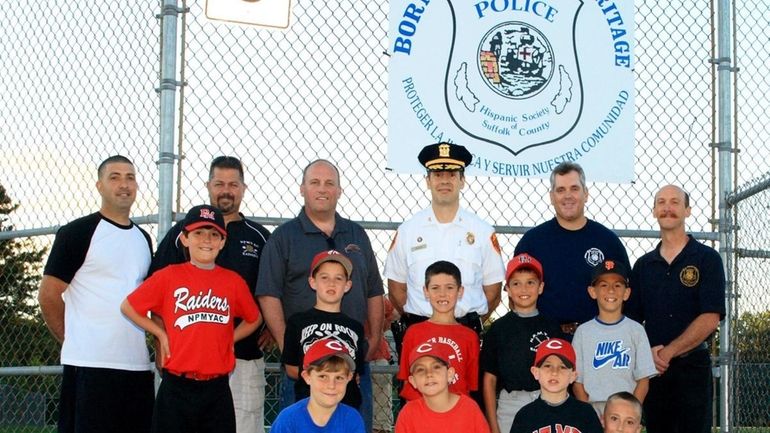 Suffolk County Police Hispanic Society members Richard Dougherty, Gerard Frielingsdop,...