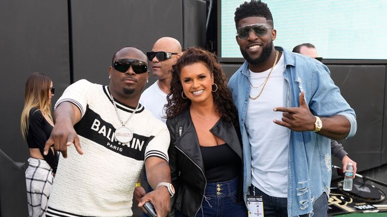 From left, television commentators LeSean McCoy, Joy Taylor and Emmanuel...