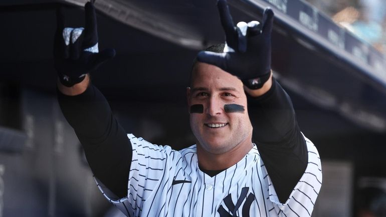 Anthony Rizzo of the Yankees celebrates after his fourth-inning home run...