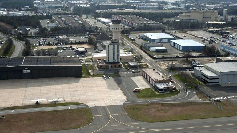 An aerial view of Long Island MacArthur Airport is shown....