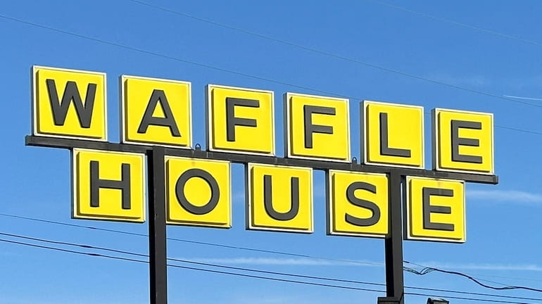A Waffle House sign is shown in Indianapolis Feb. 19,...