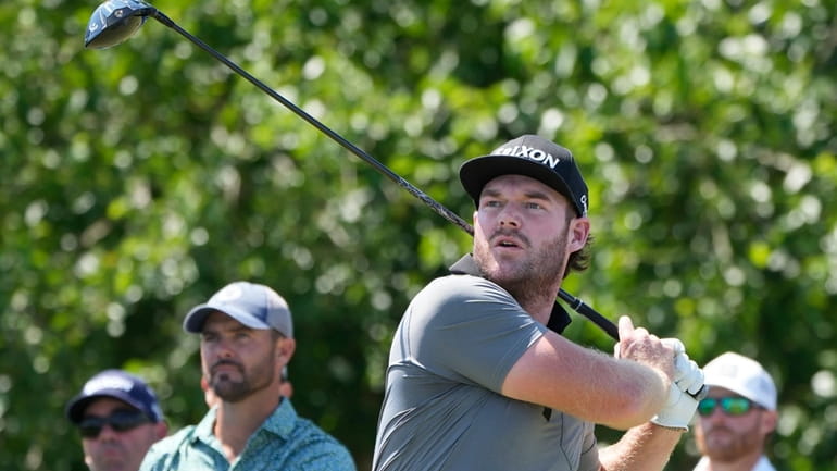 FILE -Grayson Murray hits off the 18th tee during the...