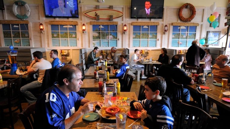 Patrons dine at Hurricane Grill and Wings restaurant in Syosset.