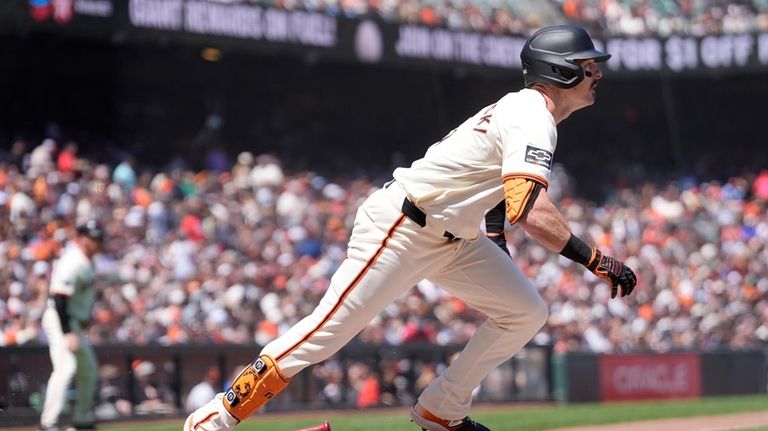 San Francisco Giants' Mike Yastrzemski watches his two-run double during...