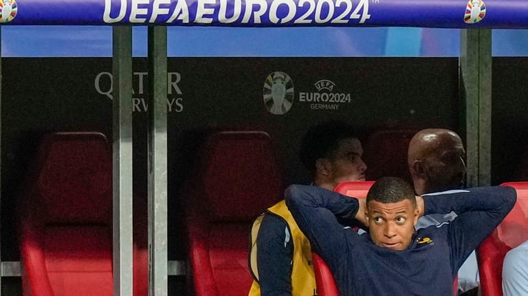 Kylian Mbappe of France reacts during a Group D match...