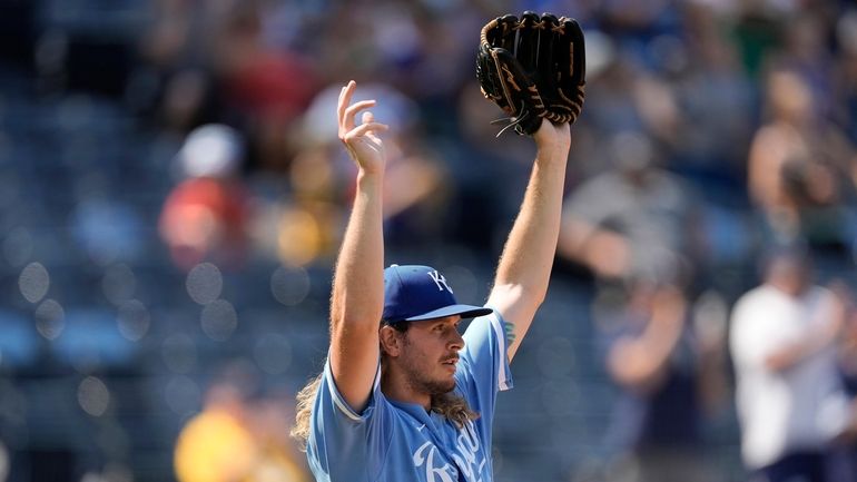 Kansas City Royals relief pitcher Scott Barlow celebrates after a...