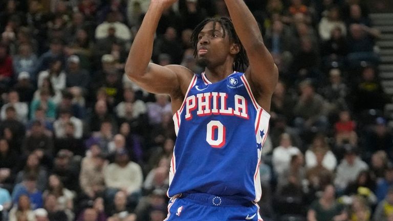 Philadelphia 76ers guard Tyrese Maxey (0) shoots against the Utah...