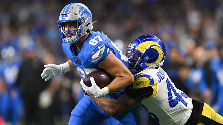 Detroit Lions tight end Sam LaPorta (87) runs after a...