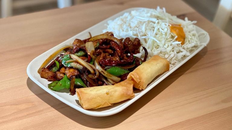 The house special hot chicken rice bowl at Ivory Kitchen...