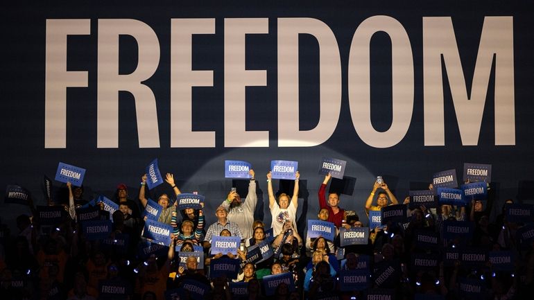 Supporters cheer Democratic presidential nominee Vice President Kamala Harris as...