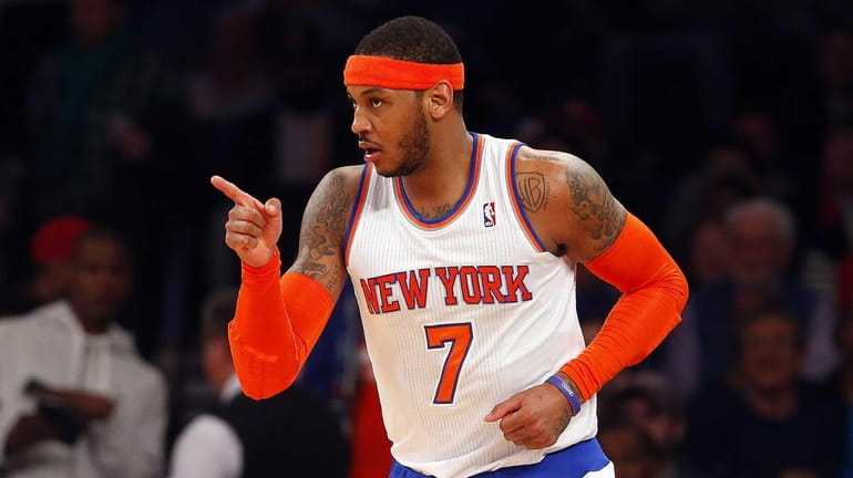 Carmelo Anthony of the Knicks reacts after a basket against...
