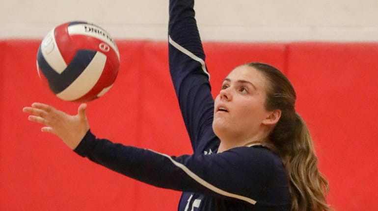 Northport's Sydnie Rohme serves the ball against Connetquot on Monday.