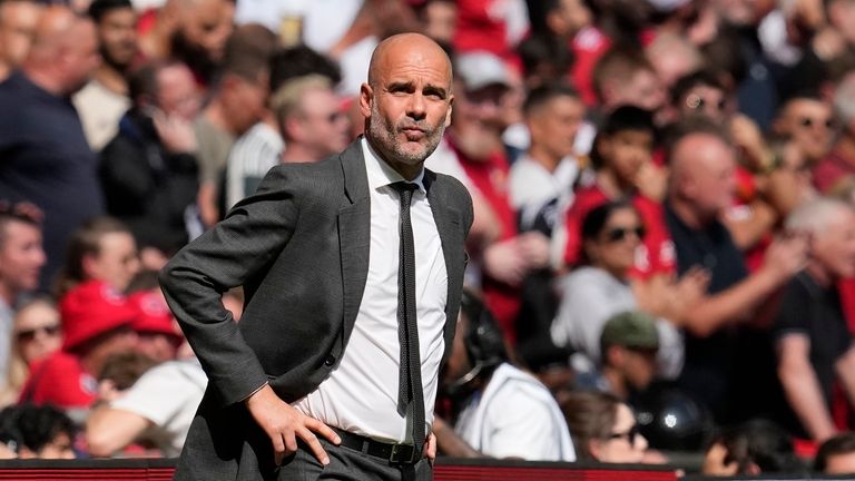 Manchester City's head coach Pep Guardiola gestures during the English...