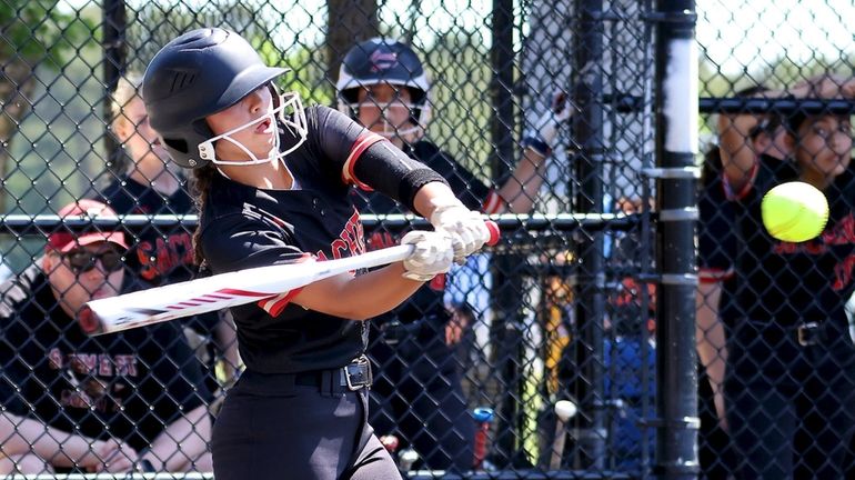 Sachem East's Gianna Prisco connects for a single against Fairport during...