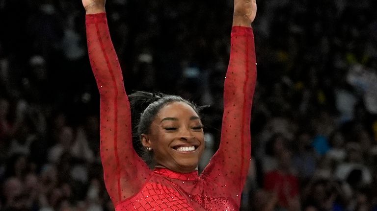 Simone Biles, of the United States, competes during the women's...