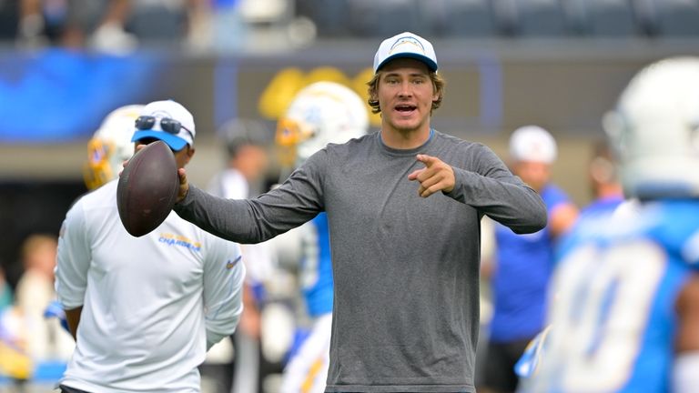 Los Angeles Chargers quarterback Justin Herbert (10) warms up before...