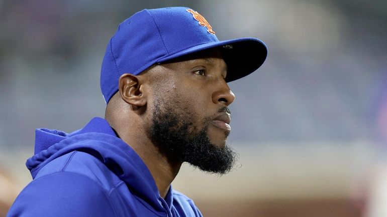 Starling Marte of the Mets looks on against the Yankees at...