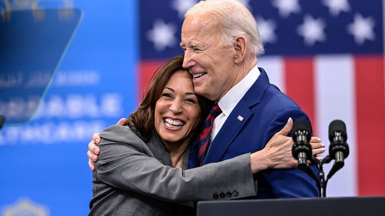 Vice President Kamala Harris with President Joe Biden after a...