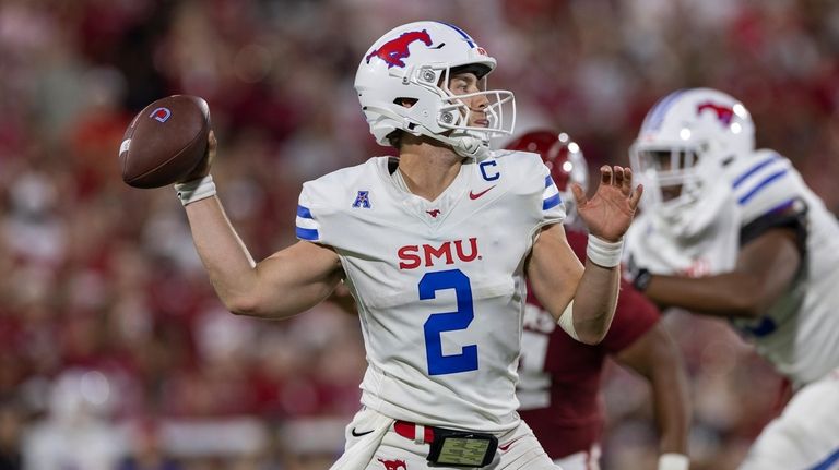 SMU quarterback Preston Stone throws a pass against Oklahoma during...