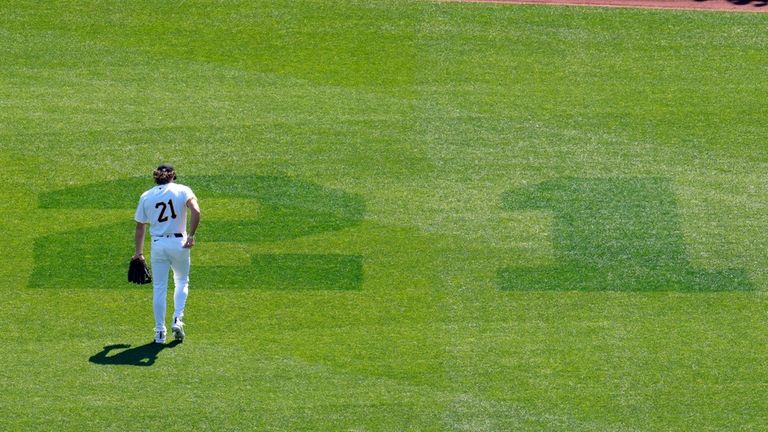 Pittsburgh Pirates' Billy Cook takes his position in right field...