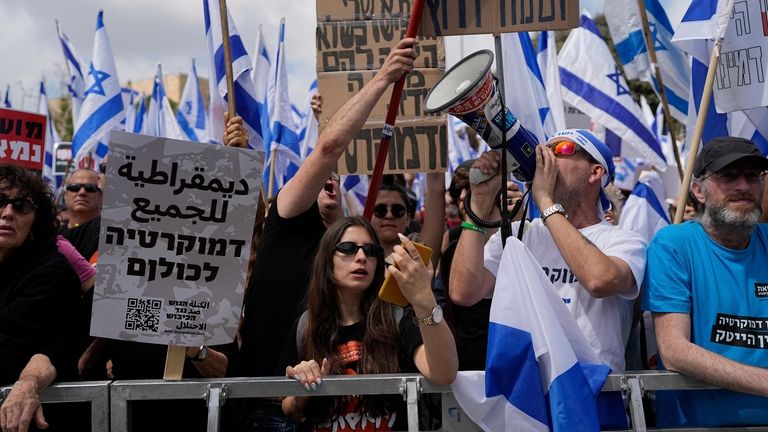 Israelis protest against Prime Minister Benjamin Netanyahu's judicial overhaul plan...