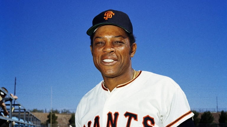 New York Giants' Willie Mays poses for a photo during...