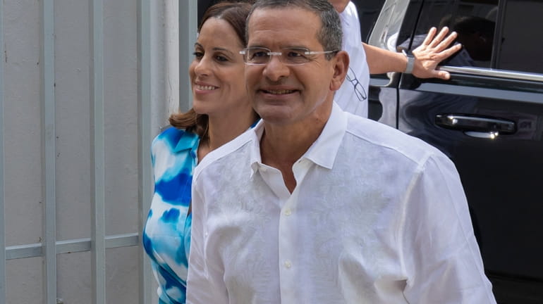 Gov. Pedro Pierluisi and his fiancee Fabiola Ansotegui Blanc arrive...