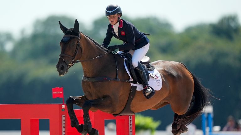 Britain's Rosalind Canter, riding Lordships Graffalo, competes in the equestrian...