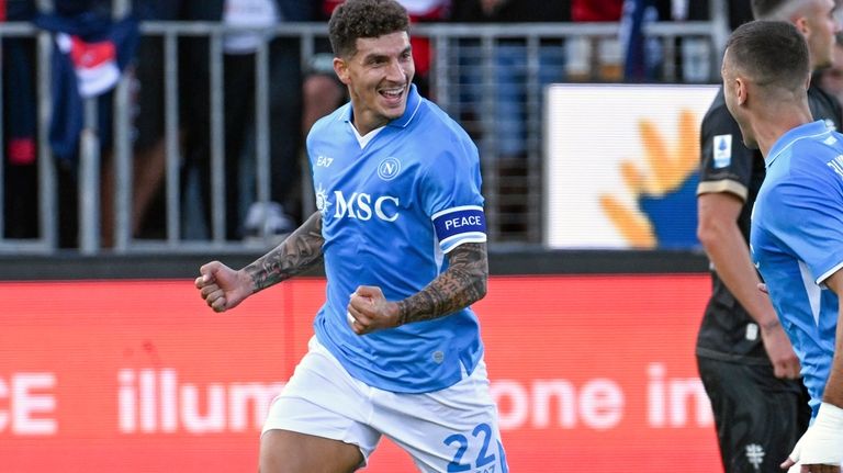 Napoli's Giovanni Di Lorenzo celebrates after scoring his side's opening...