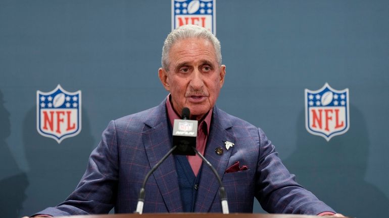 Atlanta Falcons owner Arthur Blank speaks during a news conference...