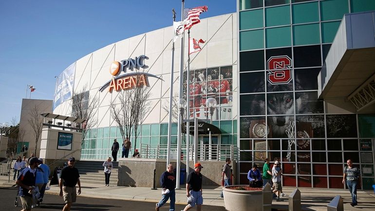 Patrons trickle into PNC Arena for a first-round men's college...