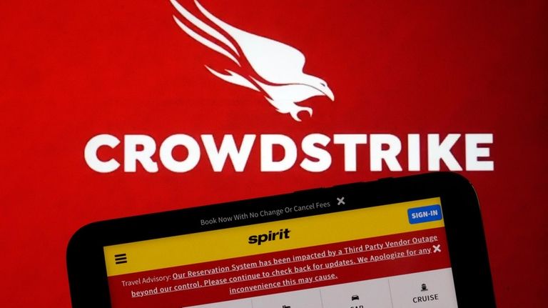 The logo for CrowdStrike and a Spirit Airlines webpage with...