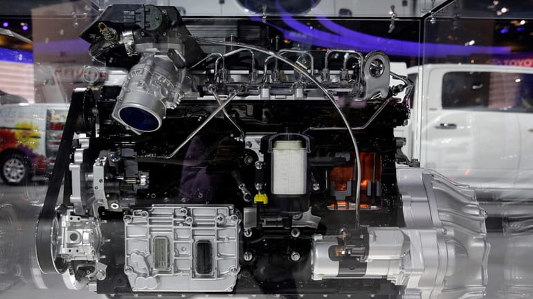 A 6.7L Cummins Diesel engine is displayed at the Ram...
