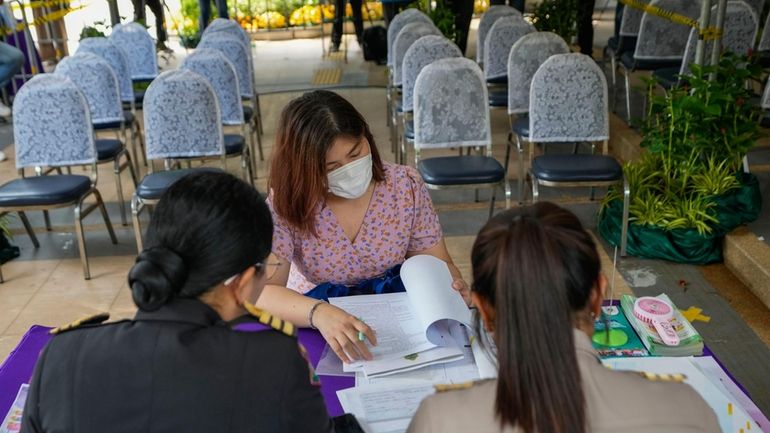 Potential candidates to become members of Thailand's next Senate arrive...