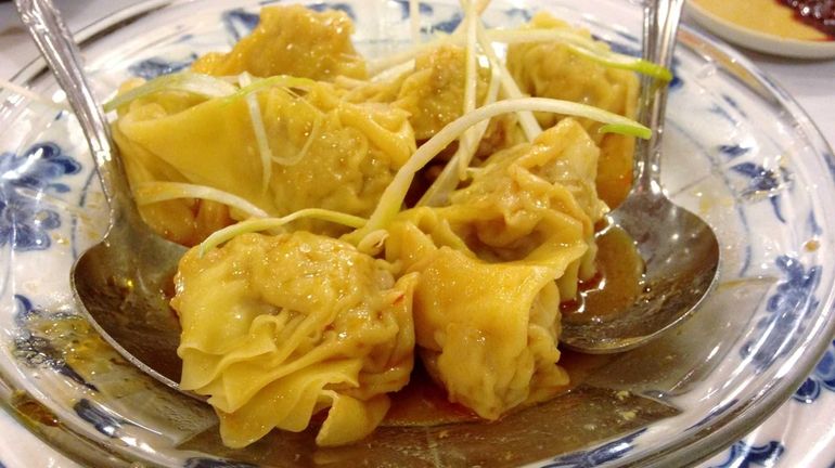 Peanut wontons (pork wontons in a spicy peanut sauce) are...