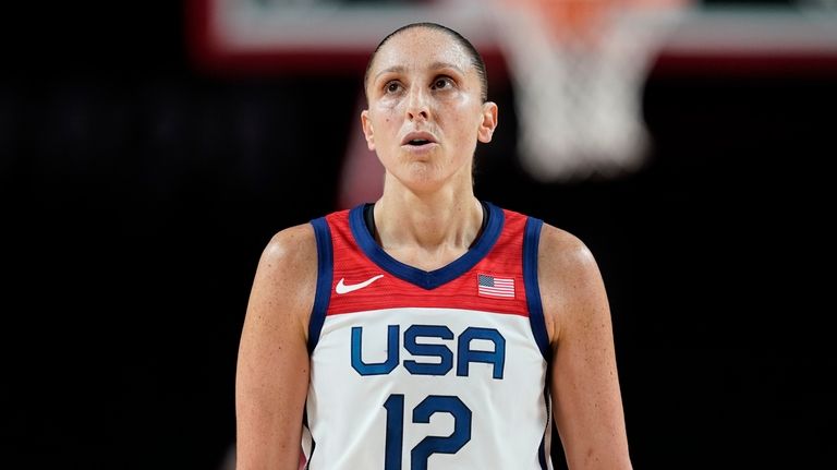 United States' Diana Taurasi (12) looks on during women's basketball...