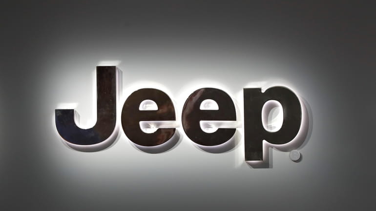 A Jeep logo is displayed at the North American International...