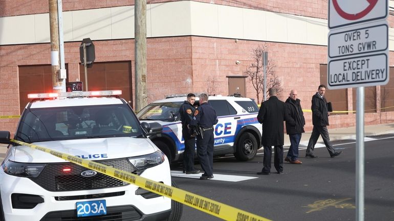 Suffolk County police Tuesday at New York Avenue and East...