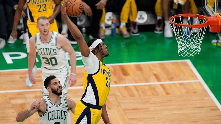 Indiana Pacers center Myles Turner (33) dunks the ball against...