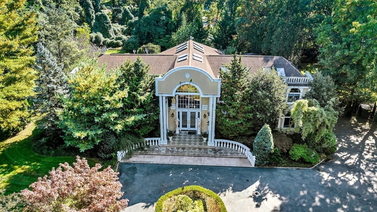 This Old Westbury home is on the market for $3.295...