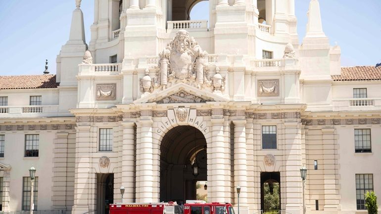 A Pasadena firetruck responds to Pasadena City Hall on Monday,...