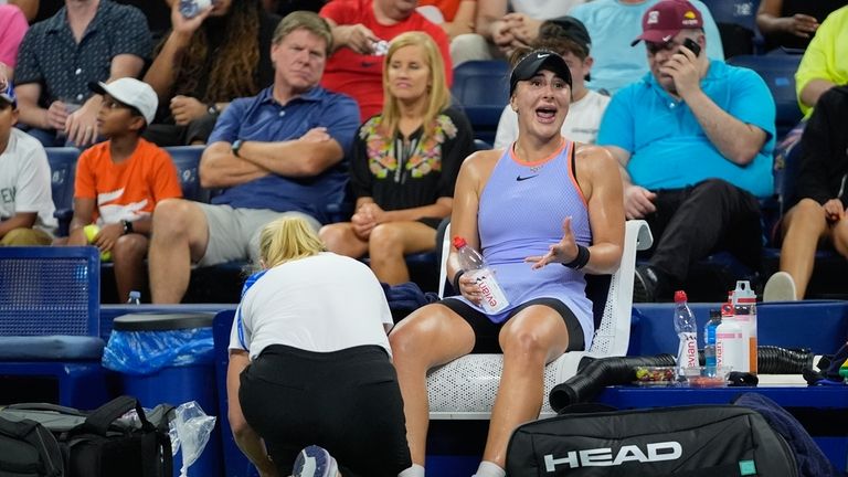 Canada's Bianca Andreescu calls out to her supporters as a...