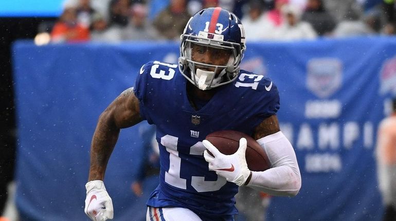 New York Giants wide receiver Odell Beckham Jr. runs with...