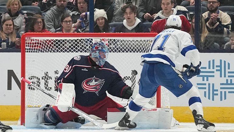 Tampa Bay Lightning center Anthony Cirelli (71) scores past Columbus...