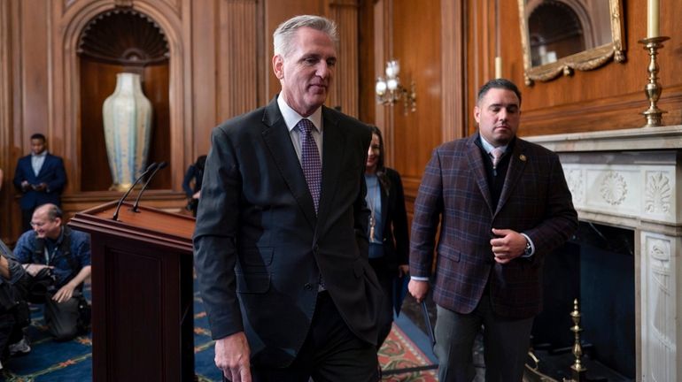 House Speaker Kevin McCarthy (R-Calif.) on the right and Rep. Anthony...