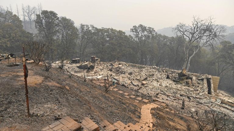 A home on Millie May Lane is destroyed by a...