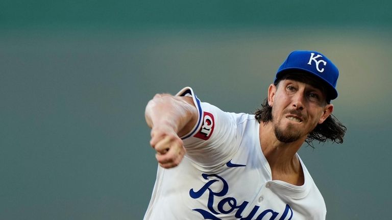 Kansas City Royals starting pitcher Michael Lorenzen throws during the...