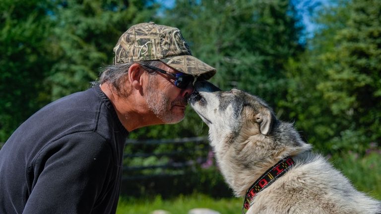 Dave Daley, a member of the Metis Nation, greets one...