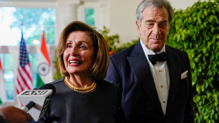 Rep. Nancy Pelosi, D-Calif., and her husband Paul Pelosi arrive...